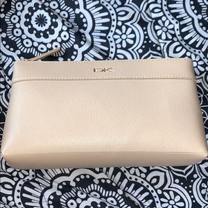 DK never used tan bag